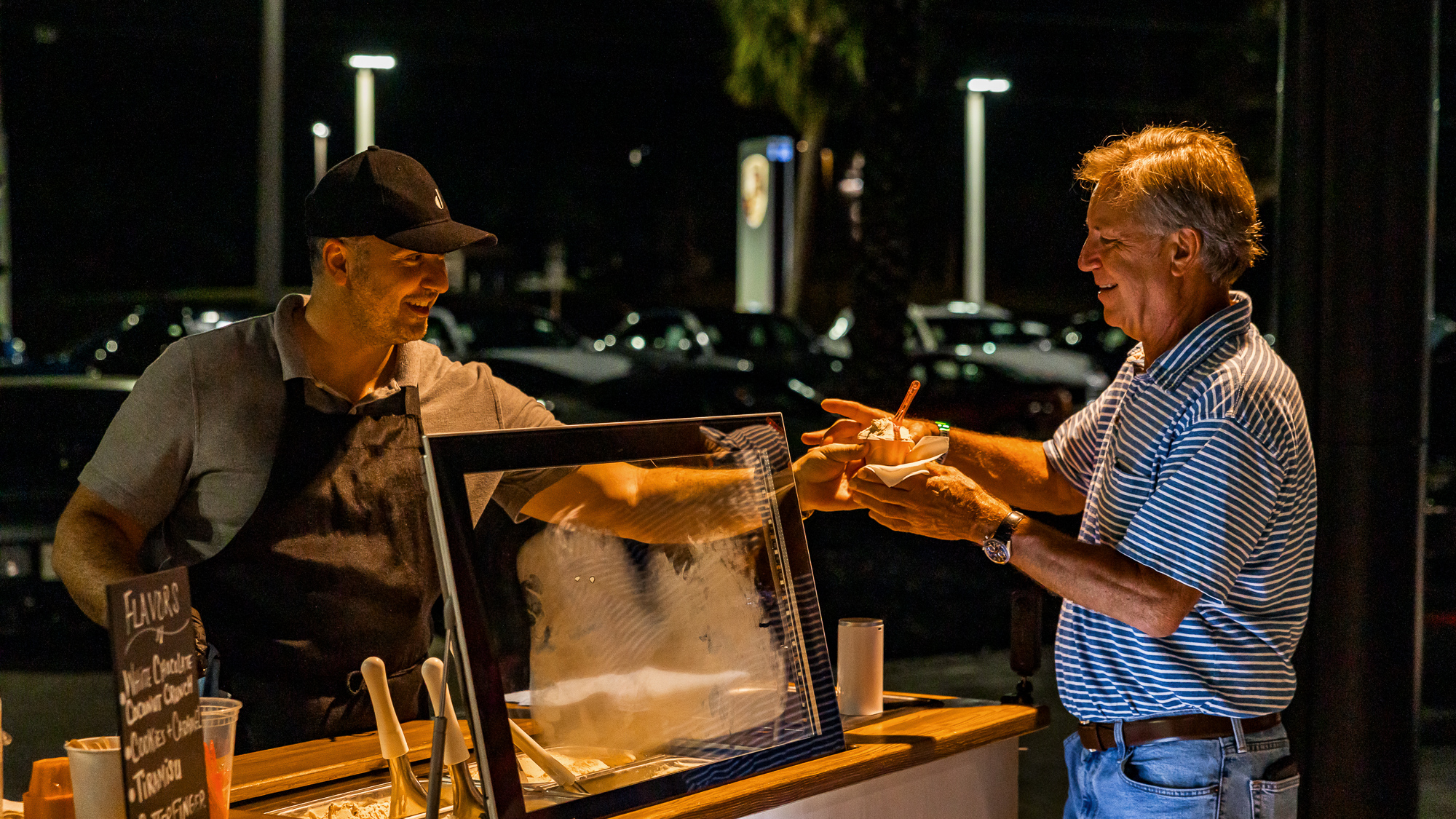 Guests enjoying gelato at an evening event