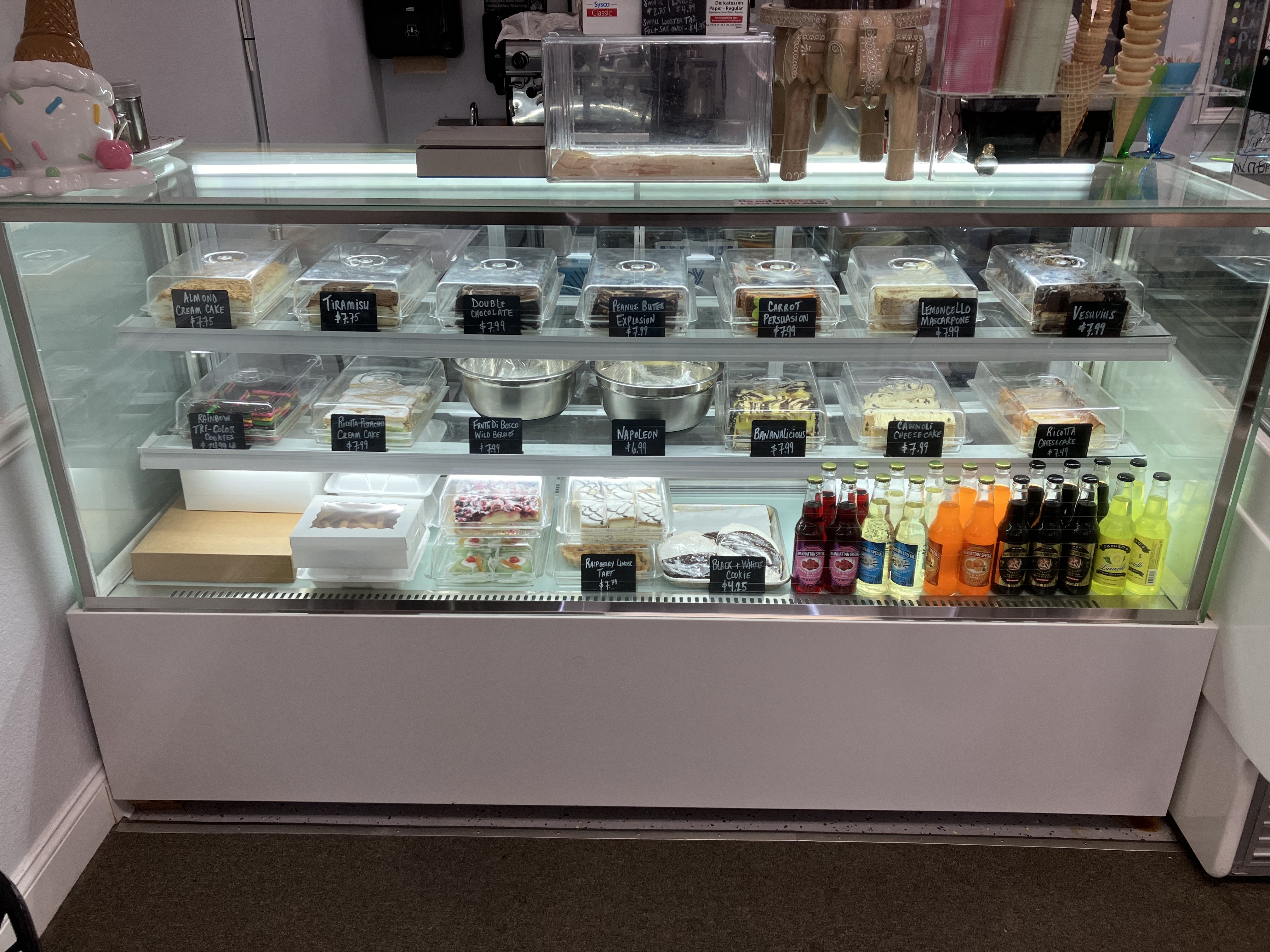 Pastry selection including tiramisu and cakes